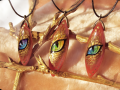 golden_dragon_eyes___stone_painting_necklaces_by_alviaalcedo-d620qey.png